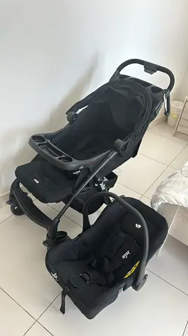 Black travel system stroller with detachable infant car seat - good condition