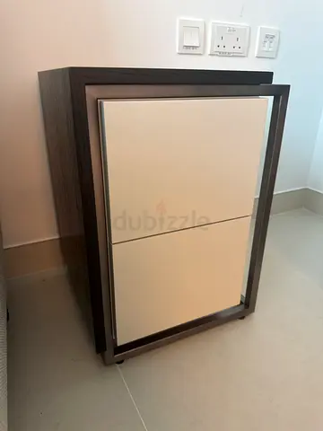Two Compact two-drawer bedside cabinet with modern wood and cream finish