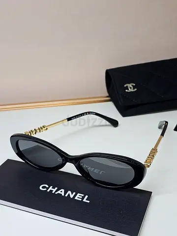 Chanel Black Oval Sunglasses with Gold Temple Accents + Case