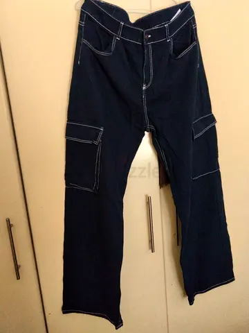 Dark navy cargo jeans with contrast white stitching - size approx