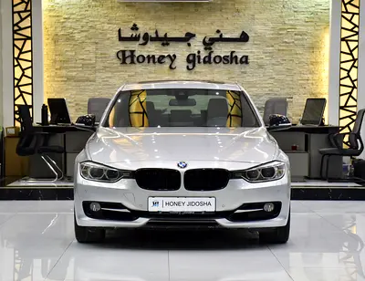 EXCELLENT DEAL for our BMW 335i Sport ( 2013 Model ) in Silver Color GCC Specs