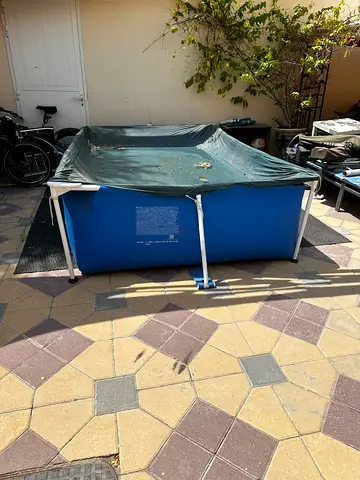 Used rectangular above-ground Intex family pool with cover - good condition