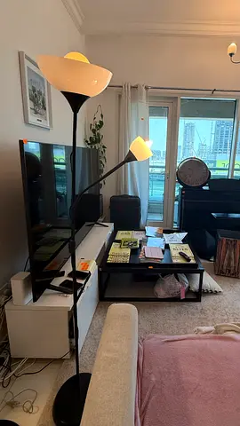 Black floor lamp with adjustable reading light - good working condition