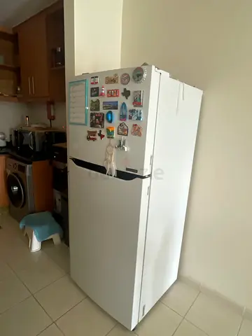 White single-door refrigerator - good working condition - Date of Handover   on 17 September 2026
