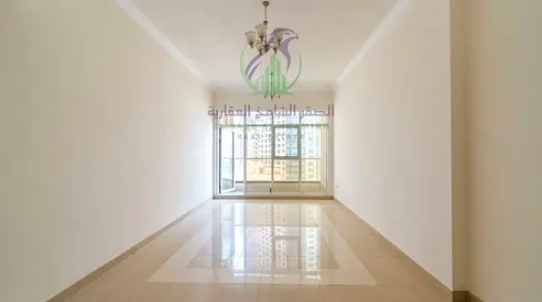 Second-tenant 2BHK with 2 master bedrooms, 2 balconies, 3 bathrooms, wardrobes, free parking, 4 or 6 cheques, near Dubai Exit.