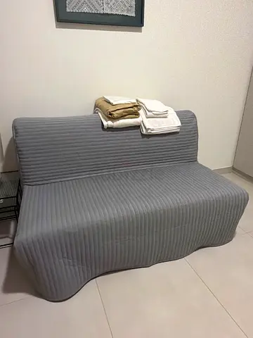 Compact 2-seater and bed grey sofa in good condition
