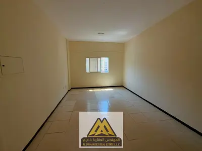 Spacious studio in Al Rashidiya 3, near Ajman One, semi-separate kitchen, central AC, parking, AED 20,008.
