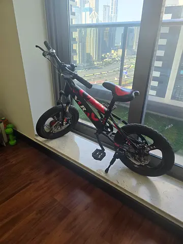 Kids 12-inch Red & Black Bicycle with Training Wheels( included). DisK brake, full alloy body.