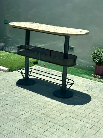 Outdoor bar table with wooden top and metal frame with 4 metal silver rust style stools
