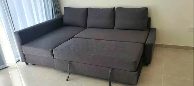 L shape sofa bed with storage like new