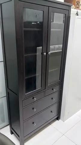 Dark wood tall cabinet with glass doors and drawers - good condition
