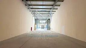 Brand-new warehouse for rent in Al Sajaa, offering 2,175 sq ft of space on a main road, with payment