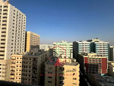 Two-bedroom apartment with a living room, open view, balcony, spacious area, free parking, and a prime location close to all essential public services