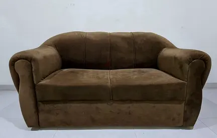 Two-seater brown fabric sofa - comfortable compact loveseat