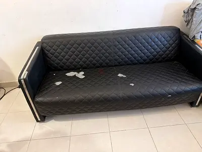 Black quilted faux leather 3-seater sofa - used