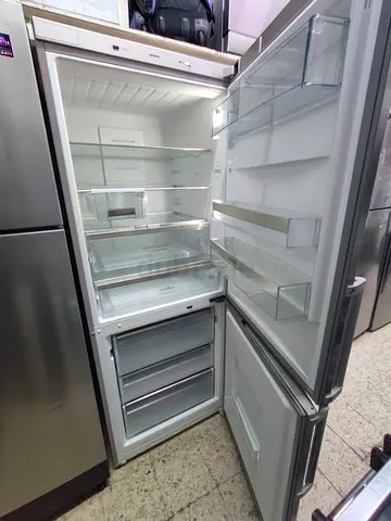 Used Stainless Steel Refrigerator with Freezer Bottom - Good Conditin