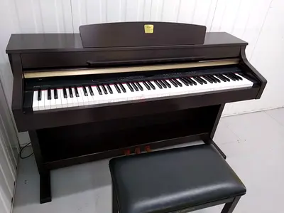 Yamaha CLP 340 rosewood With Bench