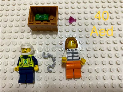 Small Lego minifigure lot: police, prisoner and accessories - used