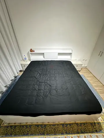 King sized mattress with black fitted cover - good condition