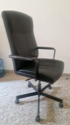 Black Leather Office Chair with Armrests and Wheels