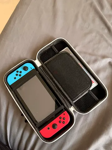 Nintendo Switch (Neon Blue/Red) with Carry Case - Used, Good Condition
