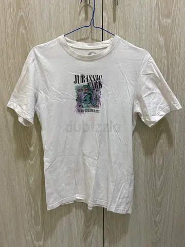 White Jurassic Park graphic T-shirt - size unspecified, lightly used
