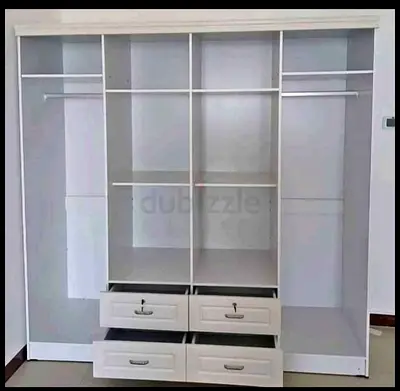 Brand New 4door cabinet good quality more details call and WhatsApp