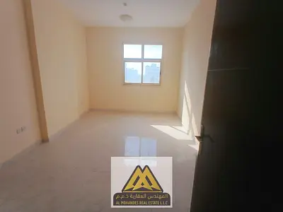 2BR in Al Alia, Ajman, 2 baths, central AC, new family building, AED 39,009 yearly, 6 payments.