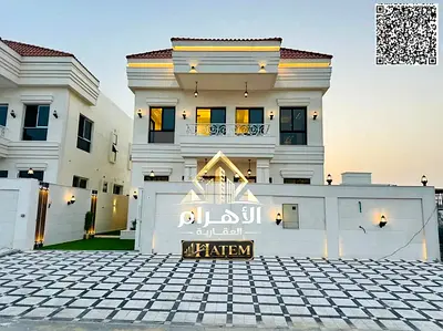 Classic-style villa for sale in Ajman | Main road location | Large setback | Al Helio 2 area | 4 be