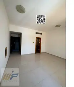 A well-maintained studio apartment is available for annual rent in Ajman, featuring a practical and 