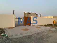 For sale: a fully equipped enclosure in Al Sajaa – electricity, water, and interlocking pavers
