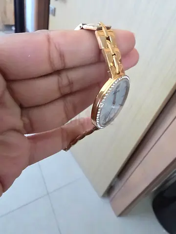 Original Swaroski gold plated women's wristwatch with crystal bezel, market value starting from 1180