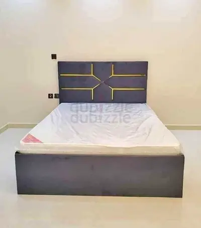 Queen size upholstered bed frame with padded headboard