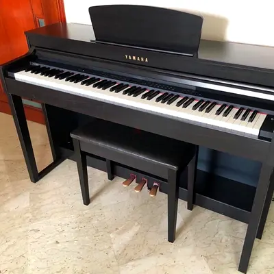 Yamaha CLP 440 rosewood With Bench