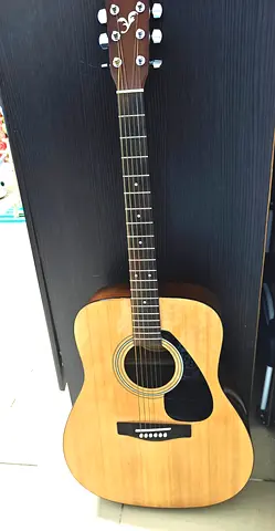Yamaha f310 acoustic guitar