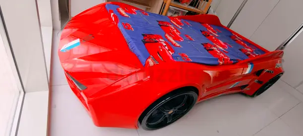 Red kids car bed