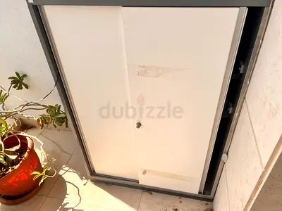 Metal sliding-door storage cabinet - 2-door office cupboard