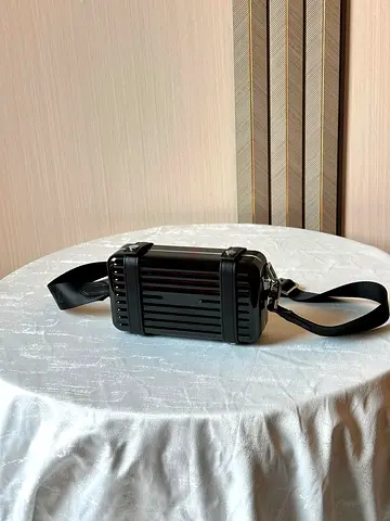 Rimowa black plastic side bag