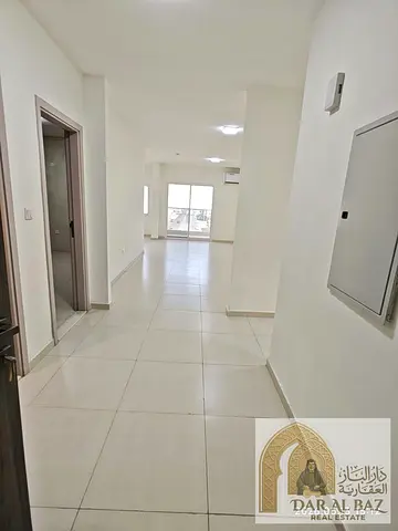 An apartment at an excellent price, featuring three rooms and a living area, in a prime location on Al Wahda Street, Al Majaz 2, Sharjah. First-time o