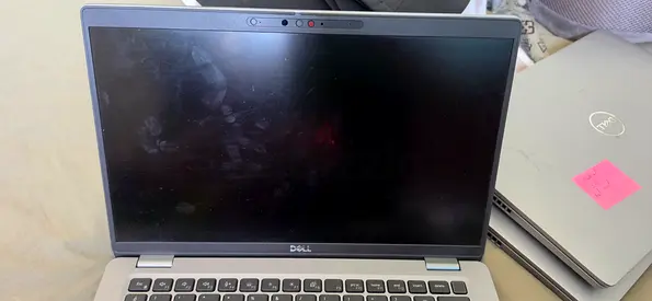 Dell Latitude laptop (14") - used, screen has smudges, powers on
