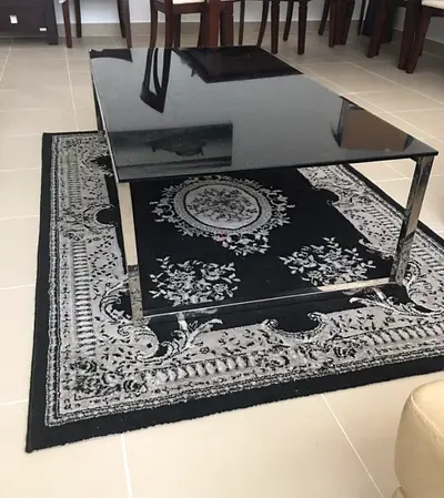 Central table with tampered glass top