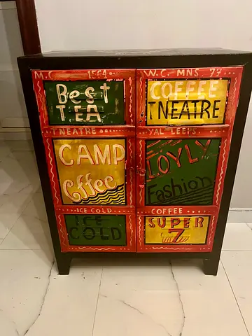 Hand-painted wooden cabinet with colorful vintage coffee panels