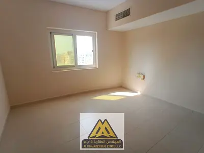 Annual Rent – 1BR | Al Karamah, Ajman. Sea view, central AC, built-in wardrobes, AED 27,000 yearly.