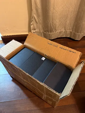 Box of carbon fiber iPhone cases