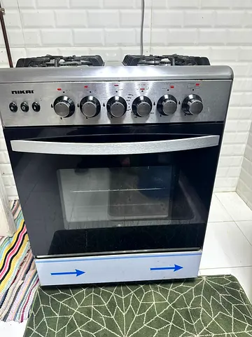 Nikai 4-Burner Gas Stove with Oven - Good Working Condition