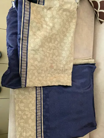 Pair of navy and cream patterned curtains - good condition