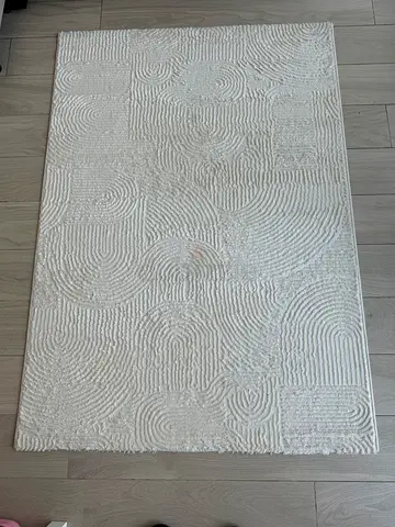 Off-white textured modern area rug - 170*120 cm (approx)