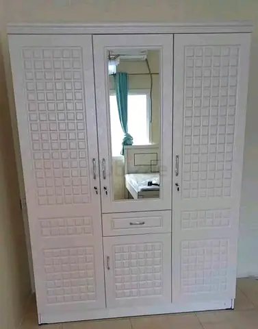 Brand new 3door wardrobe with drawer