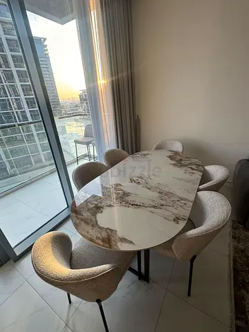 Available high quality dining table with six chairs like a new