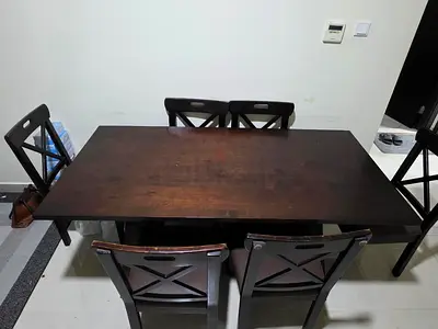 Dark wood 6-seater dining table with chairs - solid look